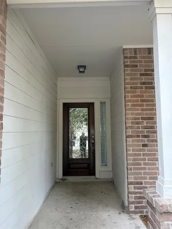 a view of a kitchen with a sink and a fireplace