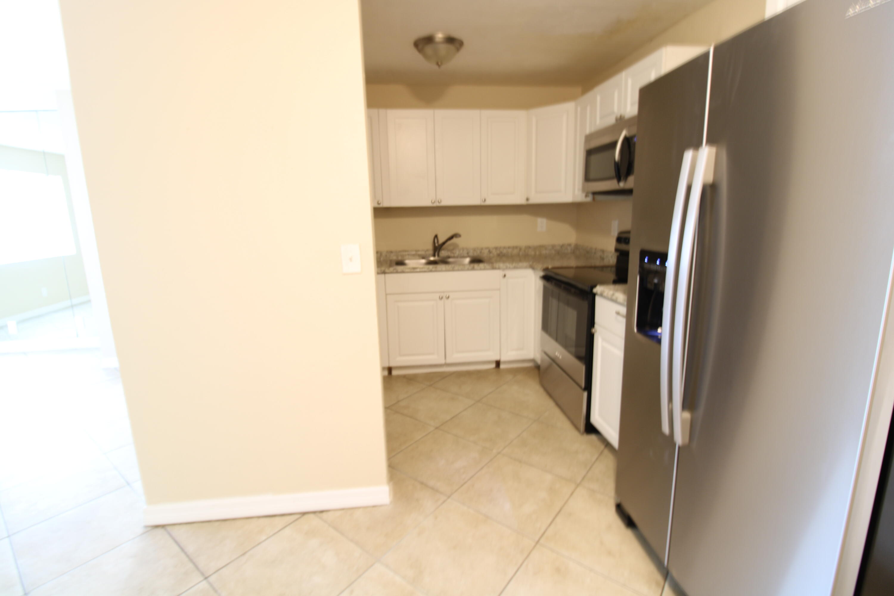 1580 Evergreen Court Riviera Beach, FL 33404 - Photo 3 of 19 IMG_0151