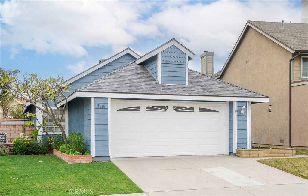 3116 Antler Road Ontario, CA 91761 - Photo 1 of 1 a front view of a house with garden