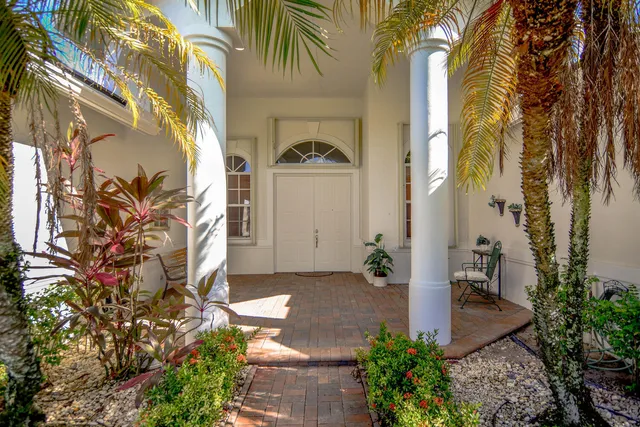a bedroom with a bed and a dresser in it