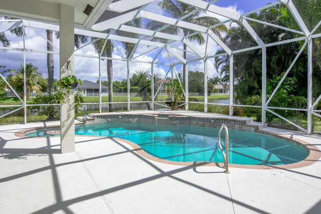 a view of workspace with furniture and window