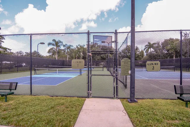 a view of swimming pool with seating space
