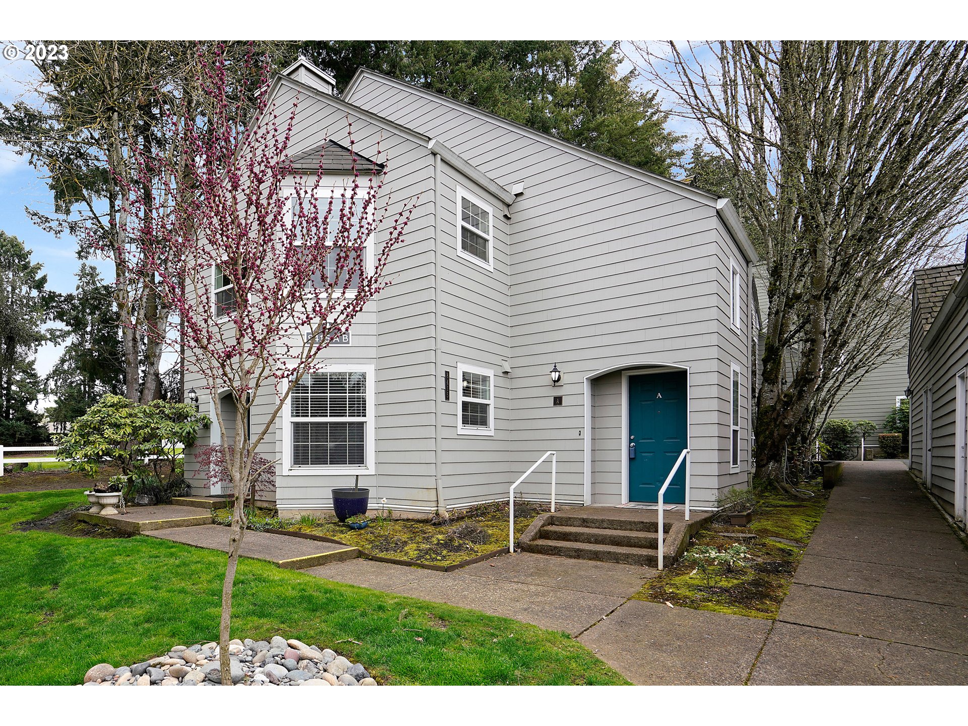 8415 Southwest Curry Drive, Unit A Wilsonville, OR 97070 - Photo 1 of 36 a view of a house with backyard