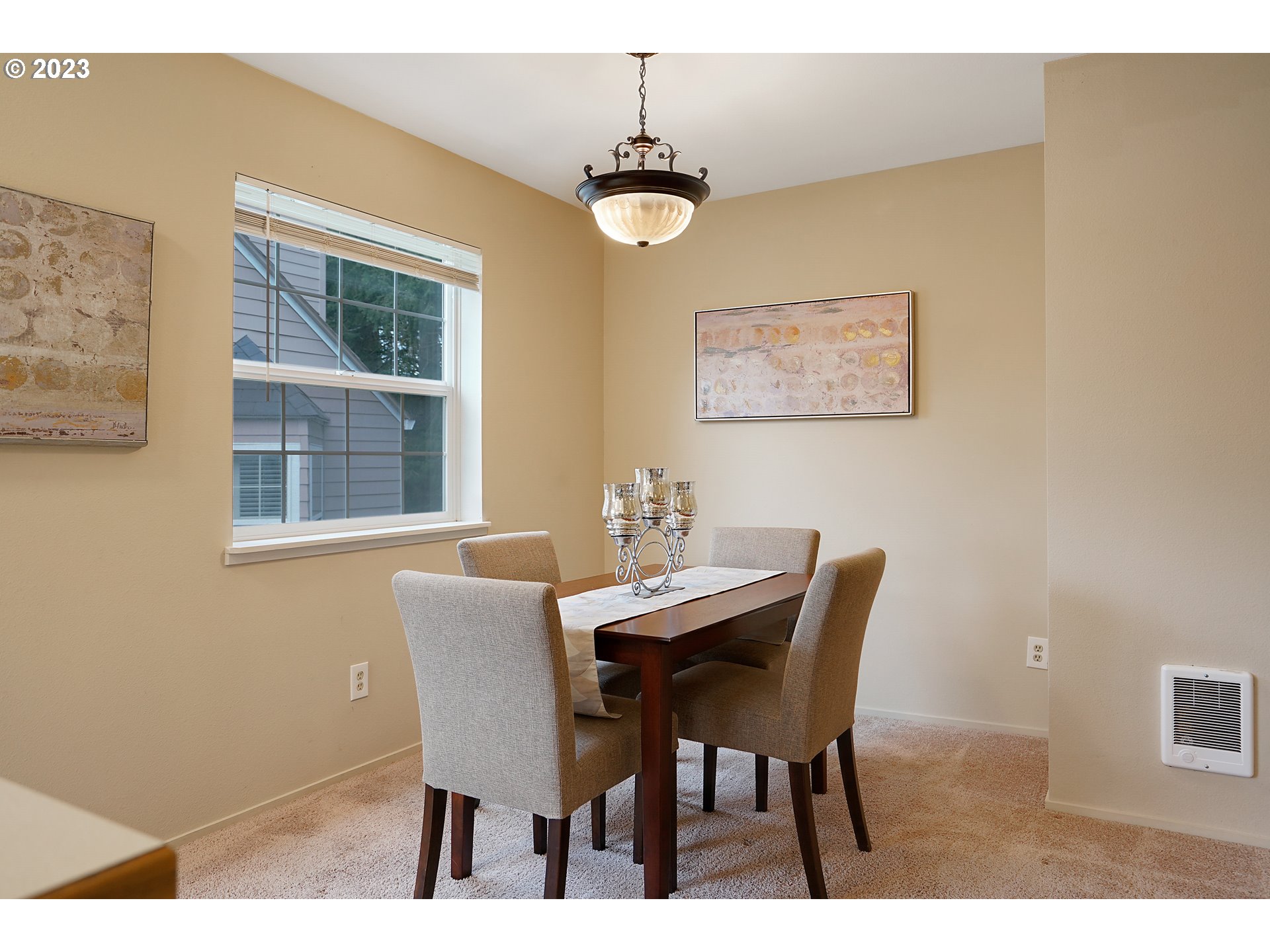 8415 Southwest Curry Drive, Unit A Wilsonville, OR 97070 - Photo 17 of 36 a dining room with furniture and window