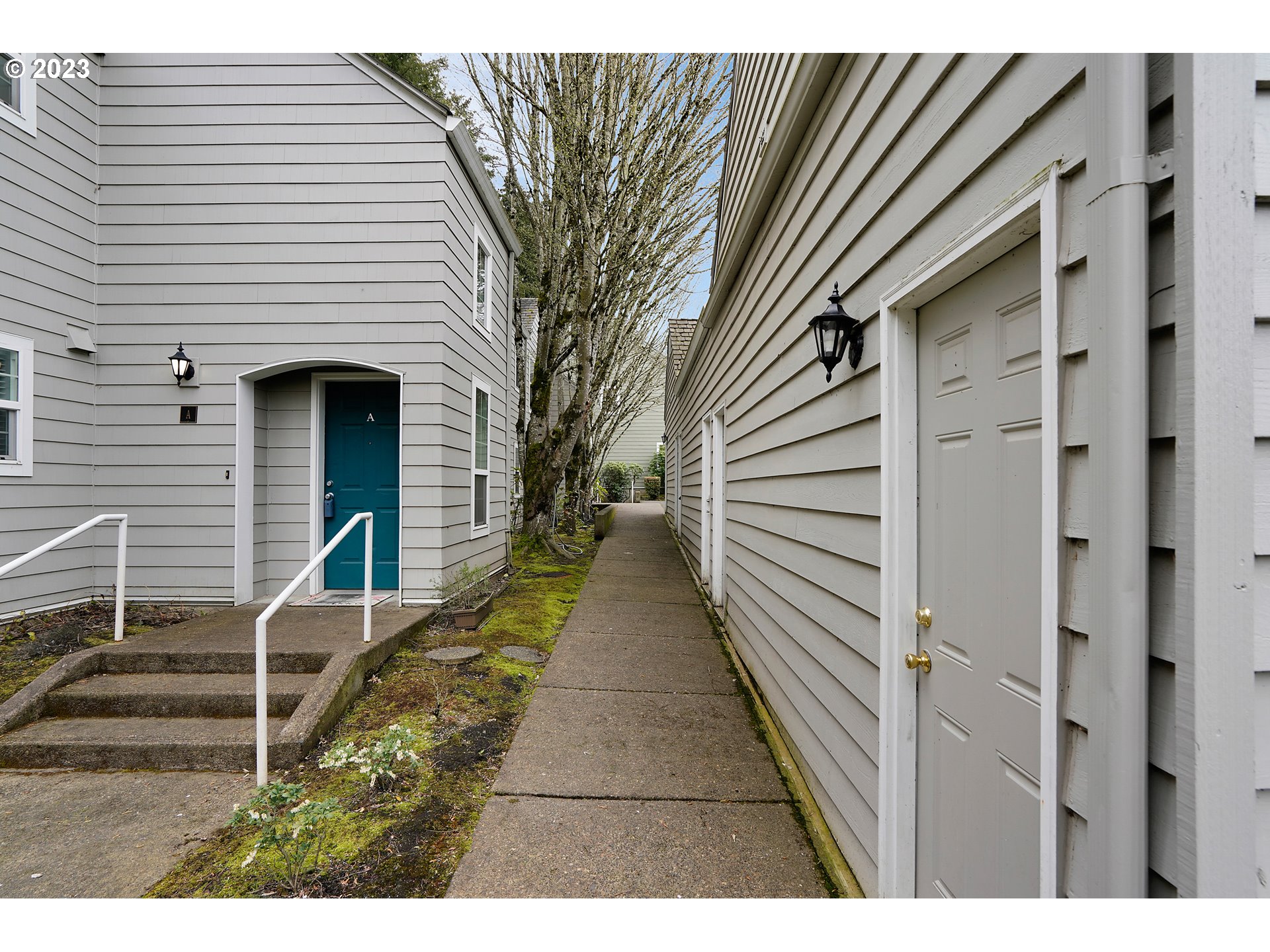 8415 Southwest Curry Drive, Unit A Wilsonville, OR 97070 - Photo 2 of 36 a view of a house with a white door