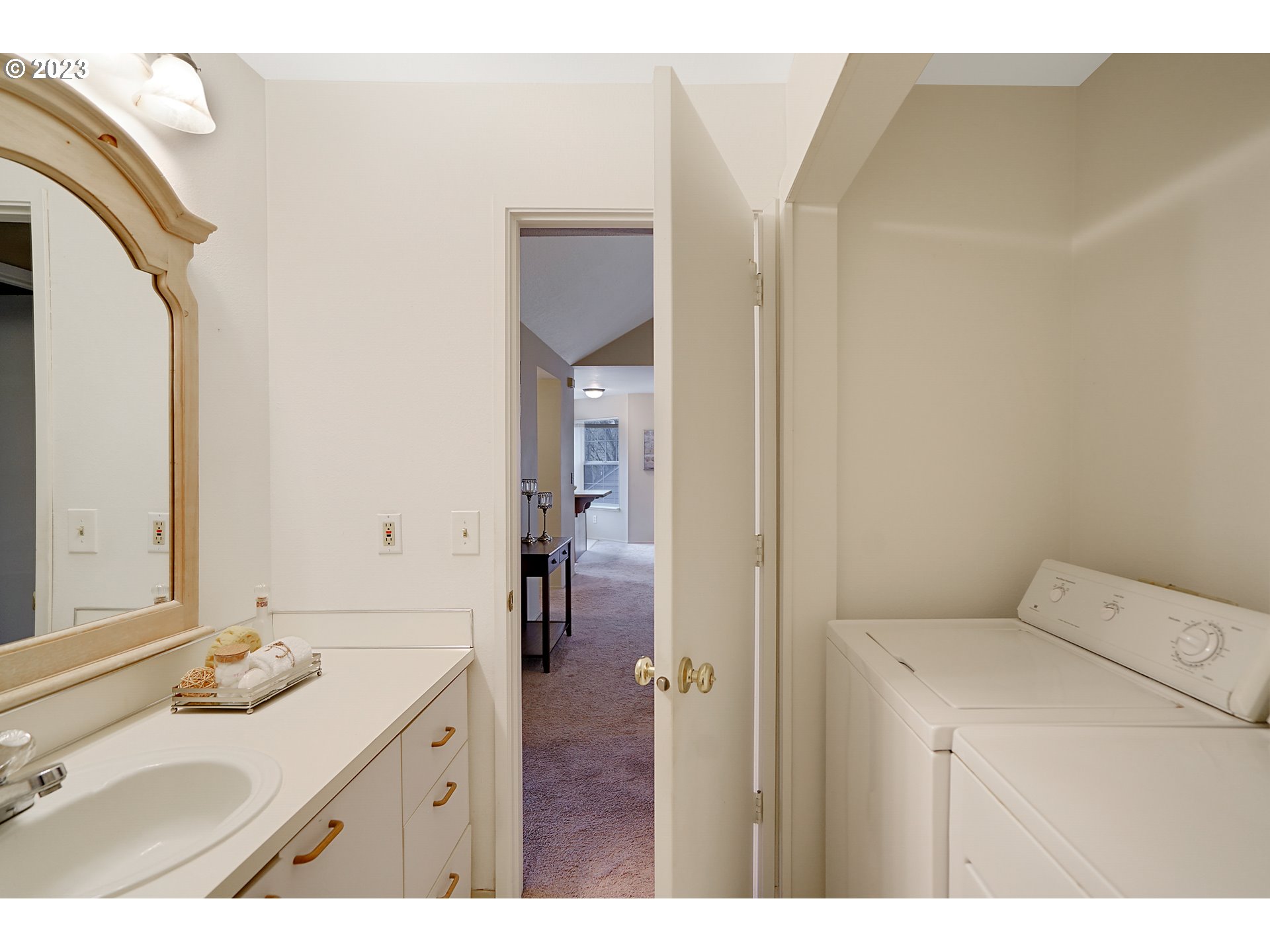 8415 Southwest Curry Drive, Unit A Wilsonville, OR 97070 - Photo 25 of 36 a bathroom with a sink and a mirror
