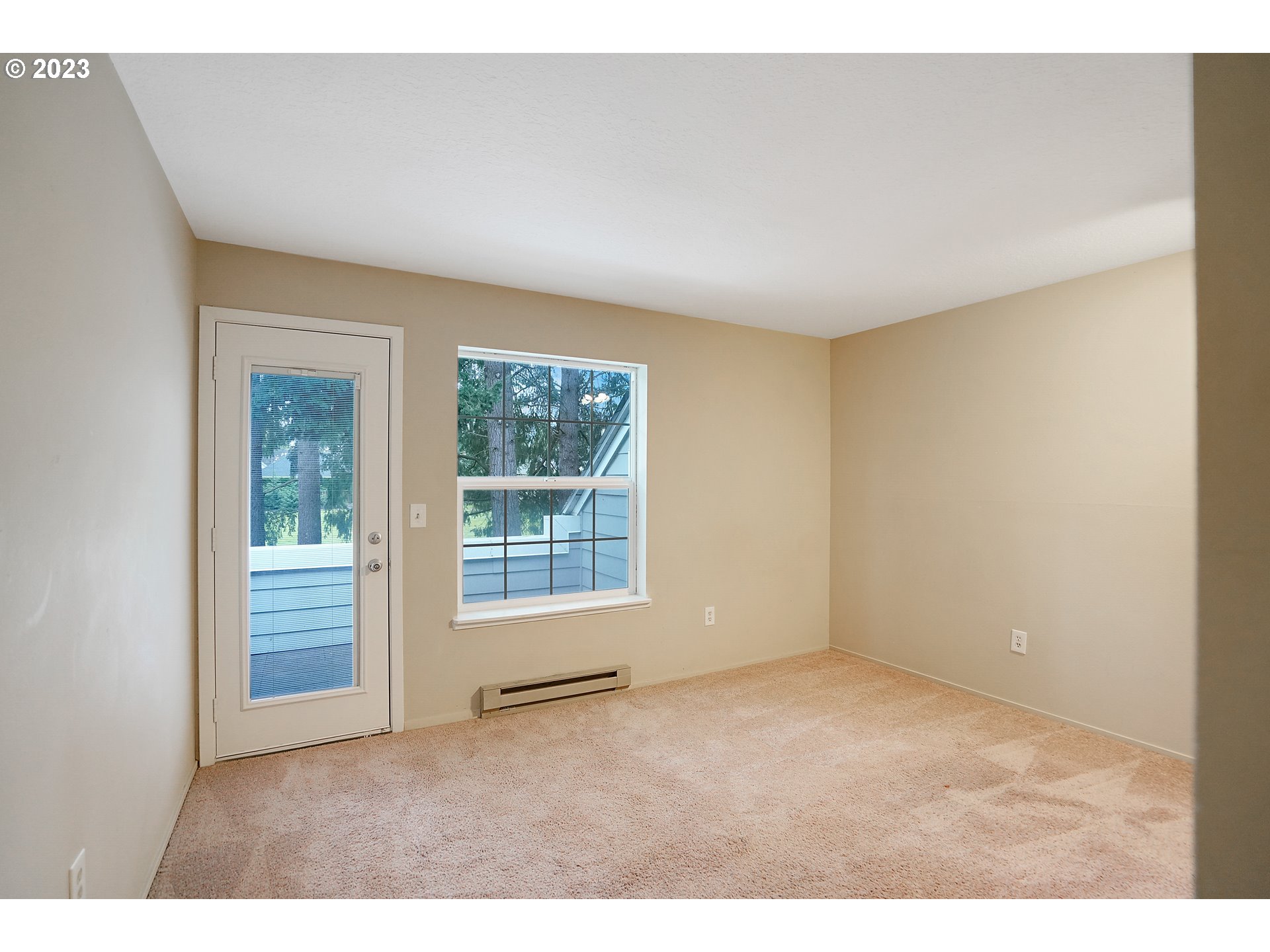 8415 Southwest Curry Drive, Unit A Wilsonville, OR 97070 - Photo 27 of 36 a view of an empty room with a window