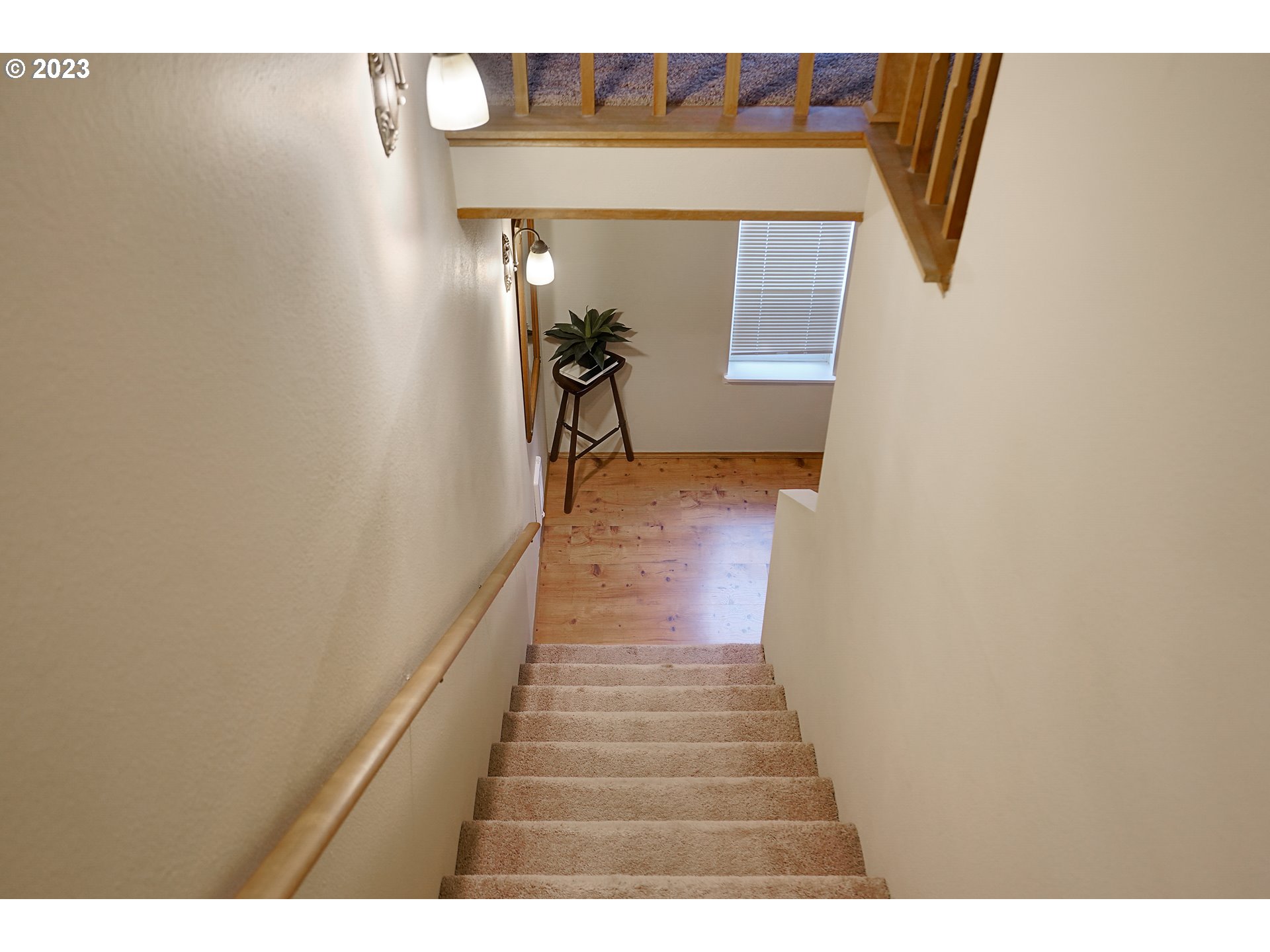 8415 Southwest Curry Drive, Unit A Wilsonville, OR 97070 - Photo 5 of 36 a view of a hallway with wooden floor and entryway