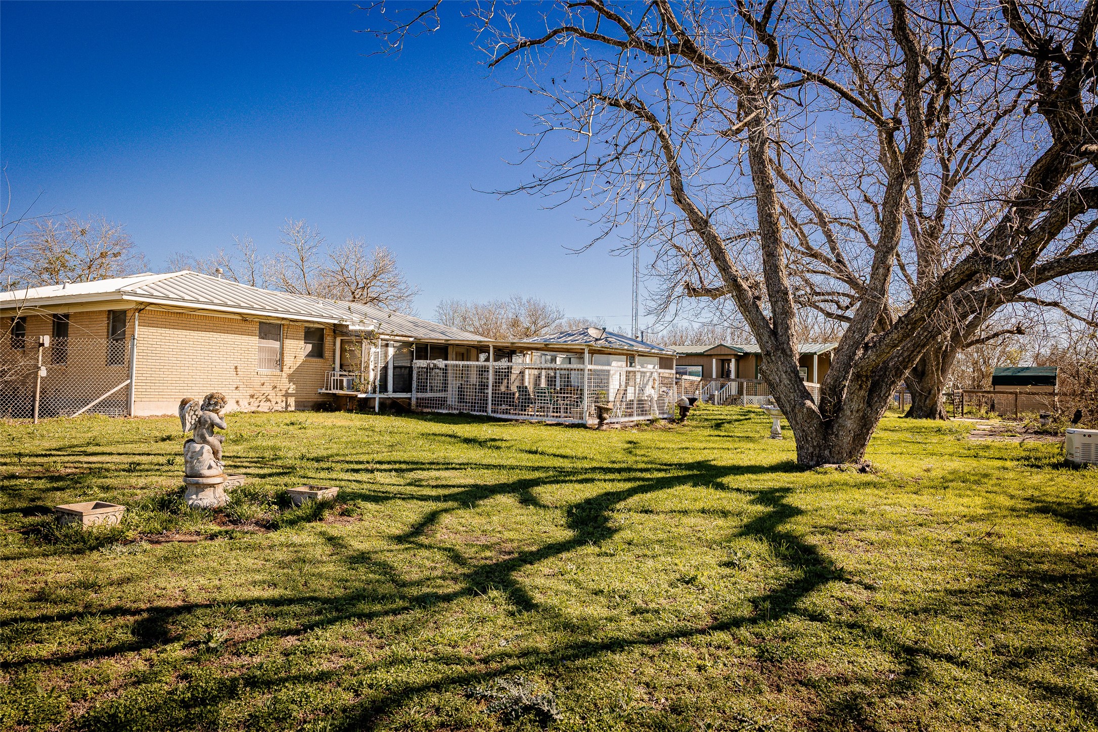 8608 Captain Scott Road Brenham, TX 77833 - Photo 20 of 28 a front view of a house with swimming pool