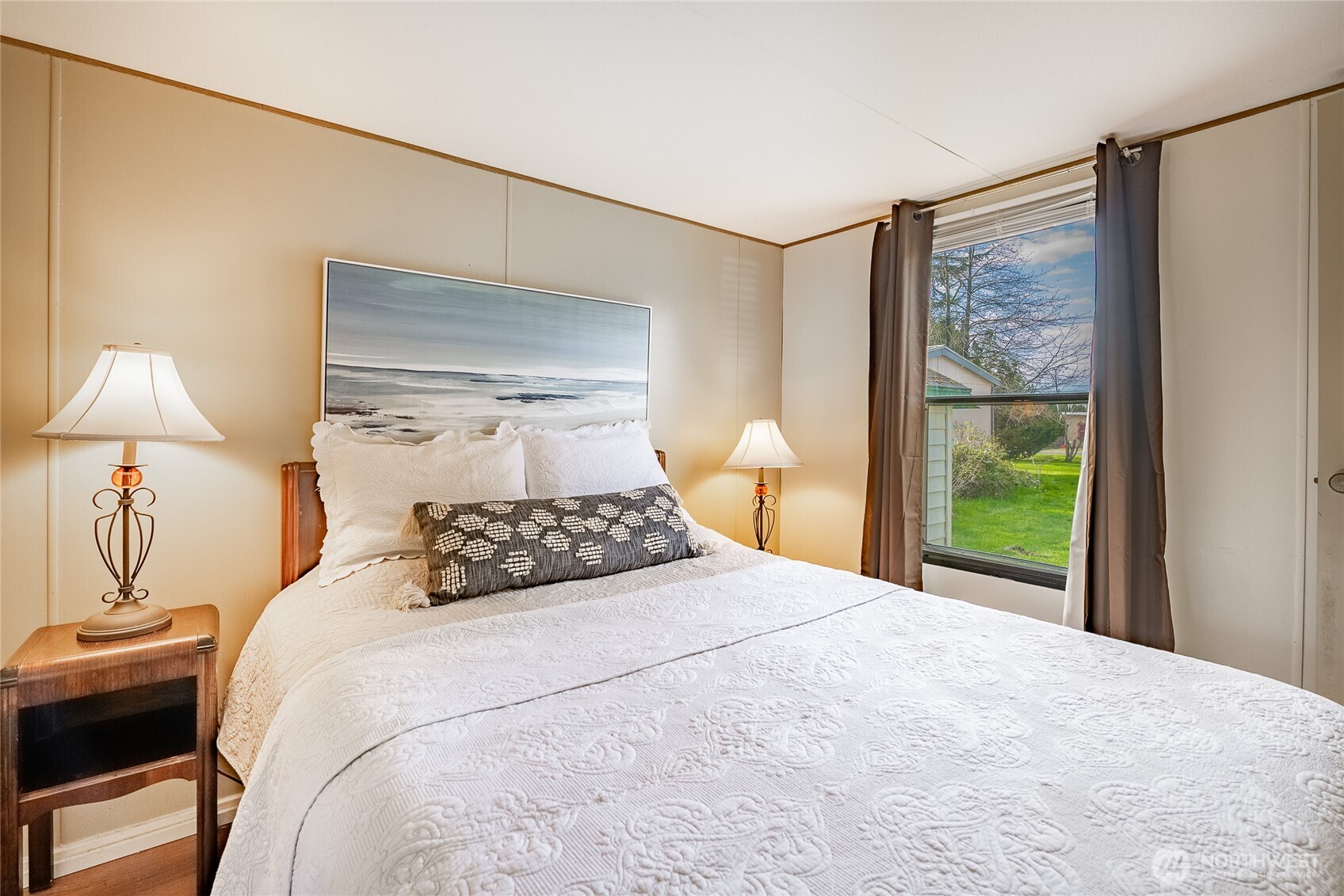 5178 Anderson Road Blaine, WA 98230 - Photo 15 of 37 a bedroom with a large bed and a window