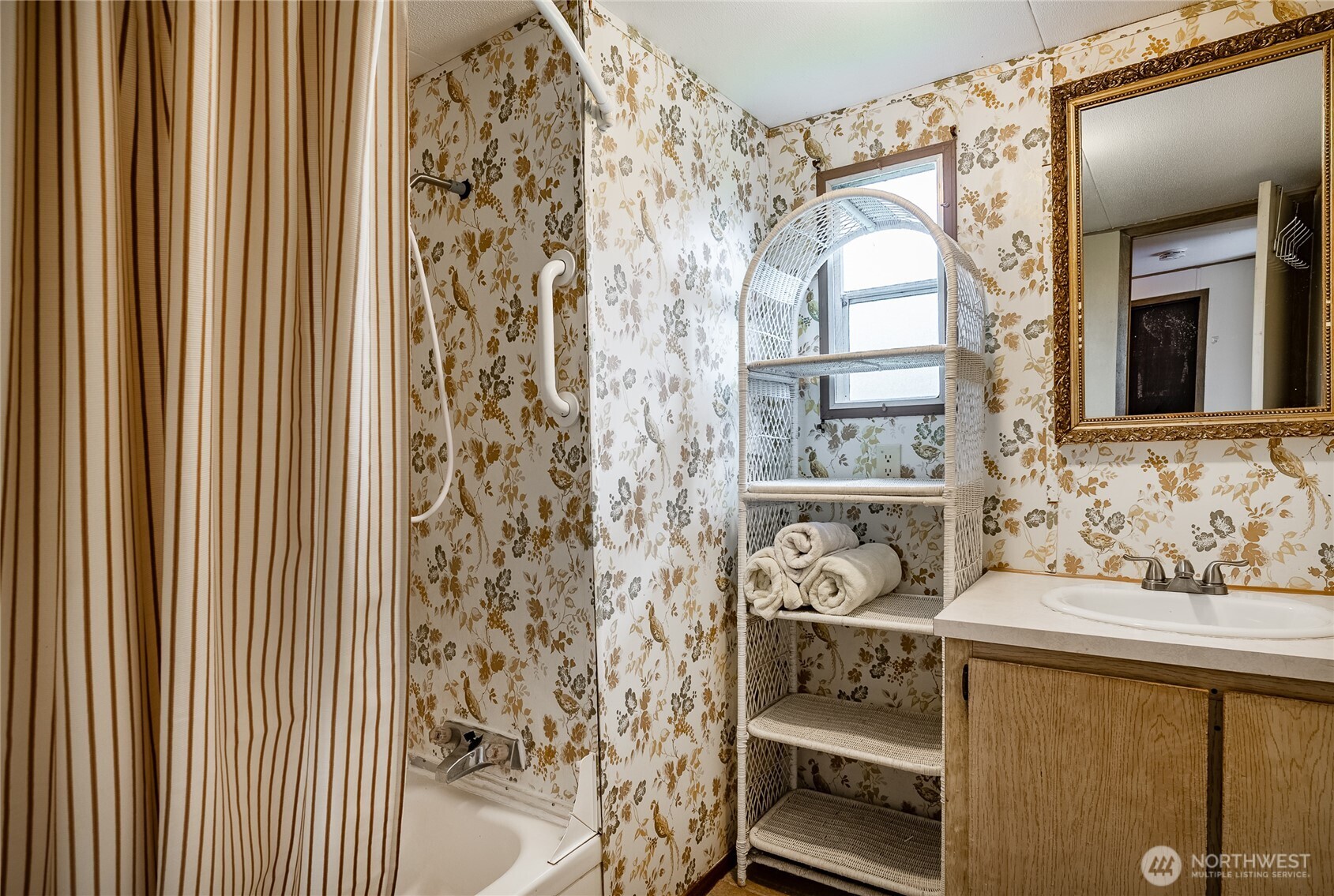 5178 Anderson Road Blaine, WA 98230 - Photo 18 of 37 a view of a bathroom with a sink and a window