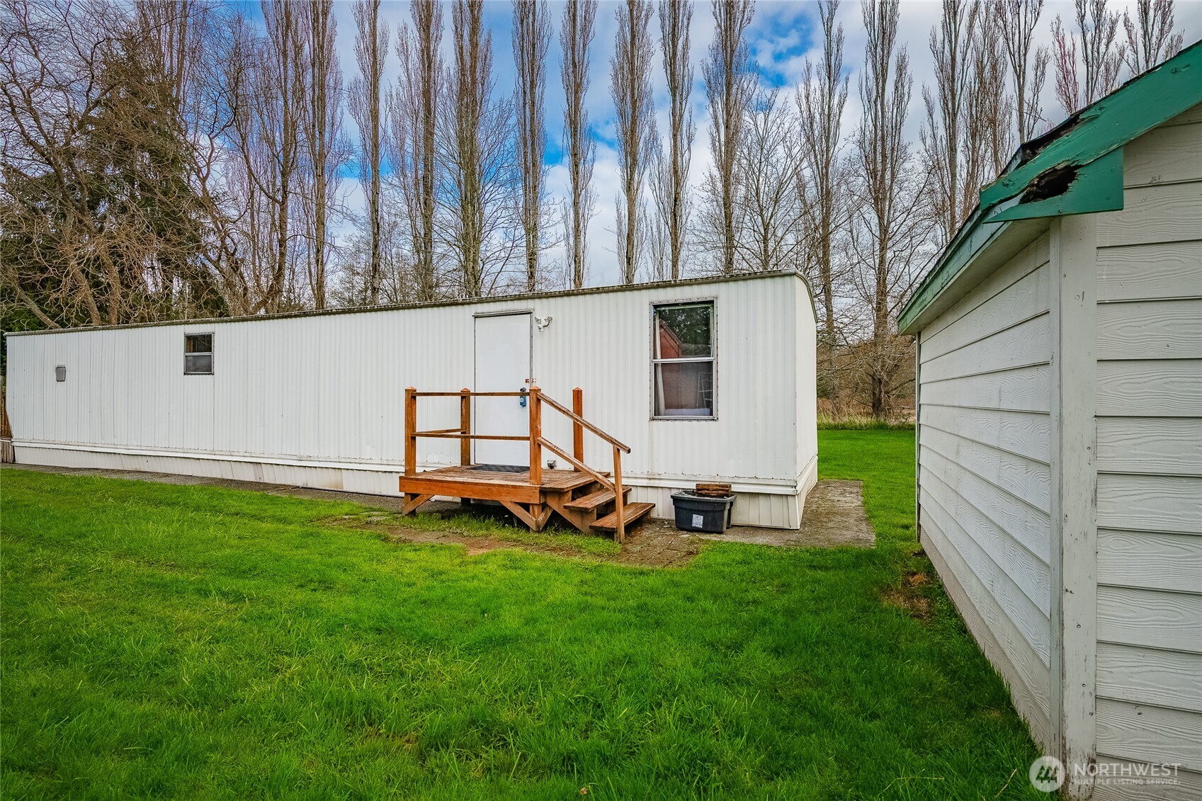5178 Anderson Road Blaine, WA 98230 - Photo 25 of 37 a backyard of a house with table and chairs