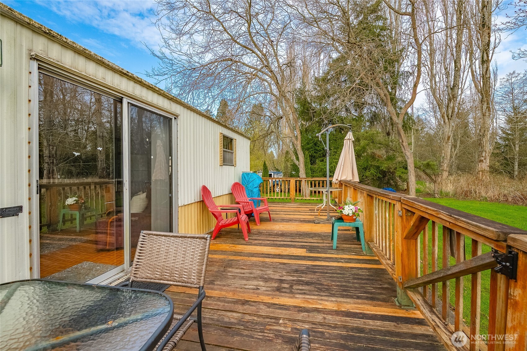 5178 Anderson Road Blaine, WA 98230 - Photo 3 of 37 a view of a deck with wooden floor and outdoor seating