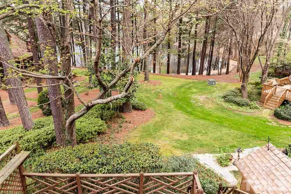 7643 Trowbridge Court Raleigh, NC 27613 - Photo 23 of 26 a view of backyard with green space