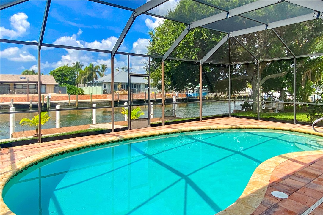 1713 Sunset Isles Road Fort Pierce, FL 34949 - Photo 30 of 36 a view of swimming pool with a patio