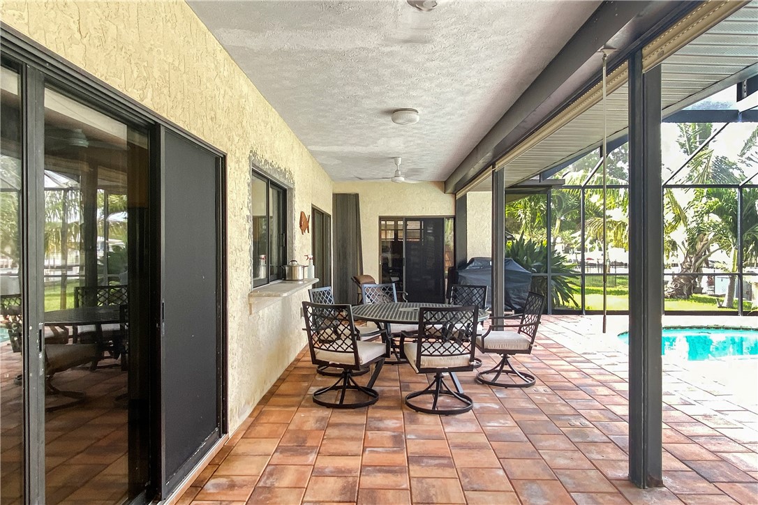1713 Sunset Isles Road Fort Pierce, FL 34949 - Photo 32 of 36 a outdoor space with chairs