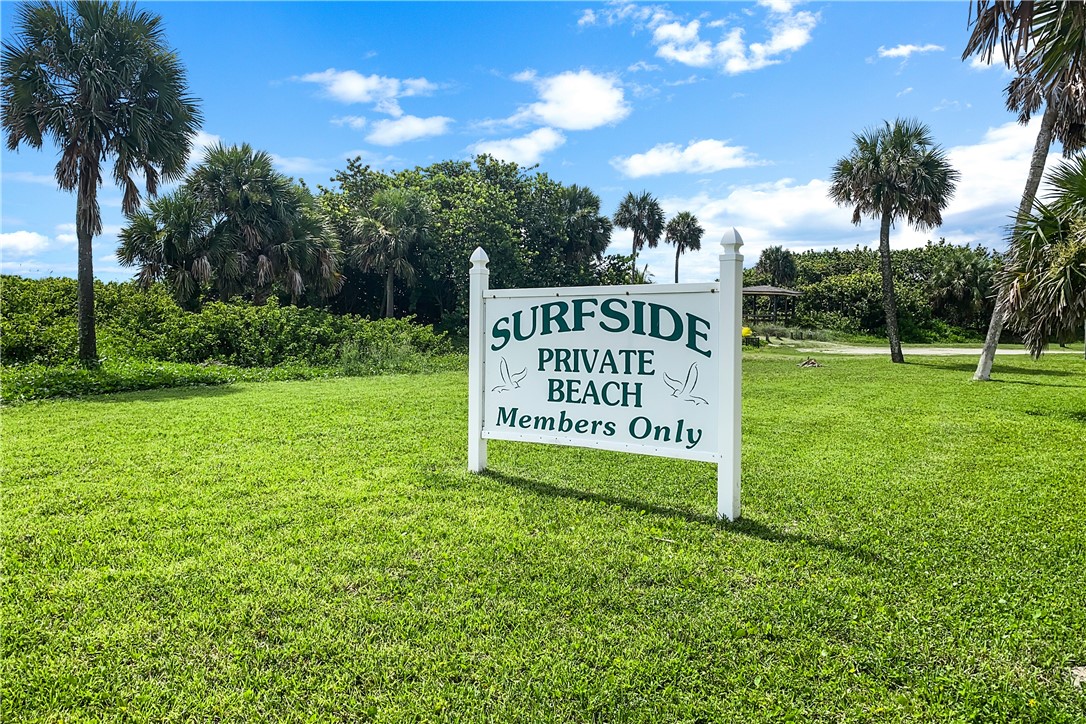 1713 Sunset Isles Road Fort Pierce, FL 34949 - Photo 33 of 36 a sign of golf club on a wall under a tree