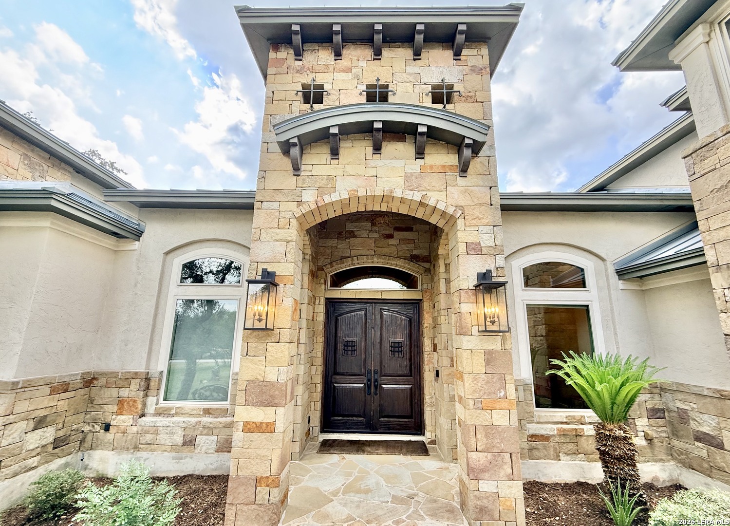 757 Copper Rim Spring Branch, TX 78070 - Photo 2 of 50 a front view of a house with garden