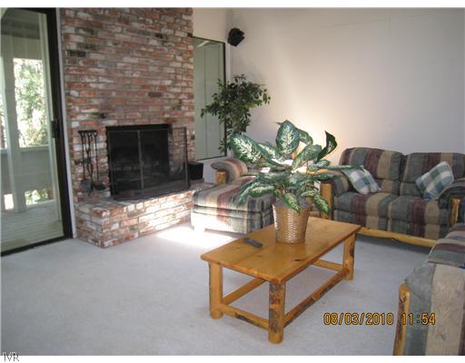 321 Ski Way, Unit 170 Incline Village, NV 89451 - Photo 2 of 8 a living room with furniture and a fireplace