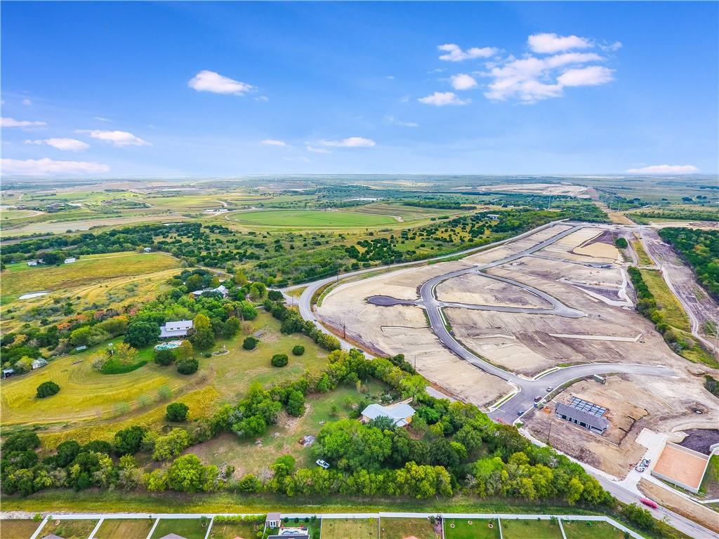 13331 Bradshaw Road Austin, TX 78747 - Photo 9 of 15 a view of a lake with a yard