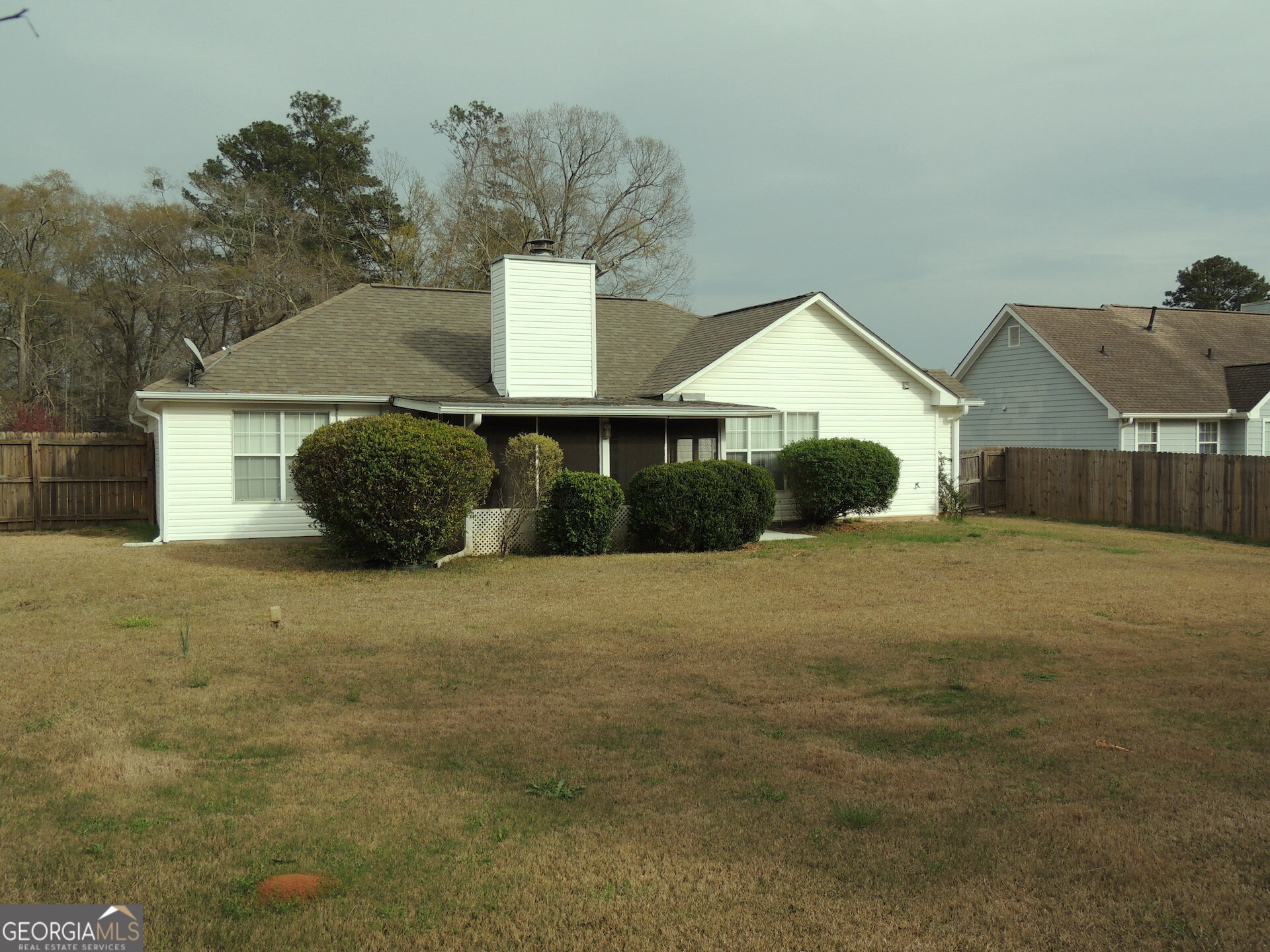 10 Brandon Drive Covington, GA 30016 - Photo 13 of 13 a front view of a house with a yard and garage