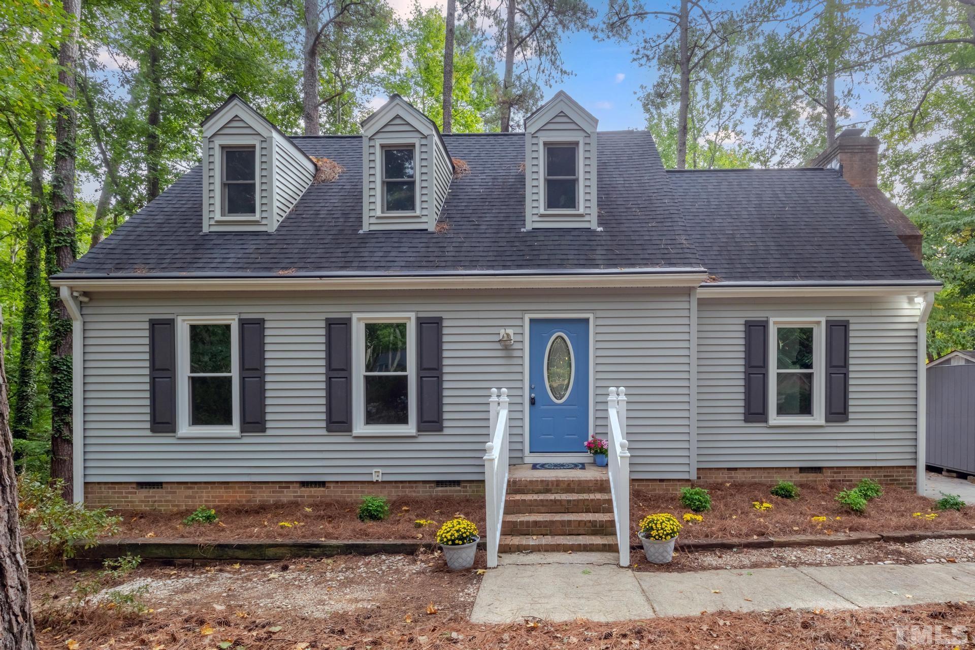 1416 Princess Anne Road Cary, NC 27513 - Photo 4 of 58 a front view of a house with garden