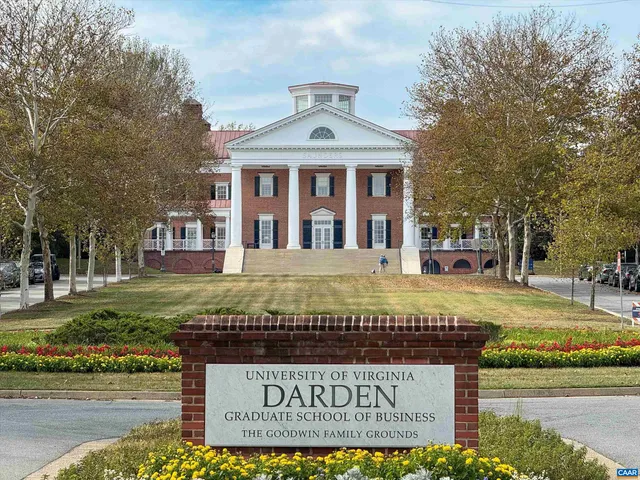 a view of a house with a yard and plants