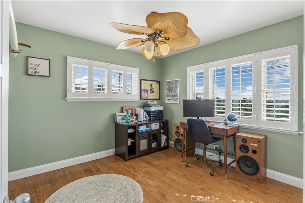 22709 Gaycrest Avenue Torrance, CA 90505 - Photo 16 of 22 a workspace with furniture cabinet and a window