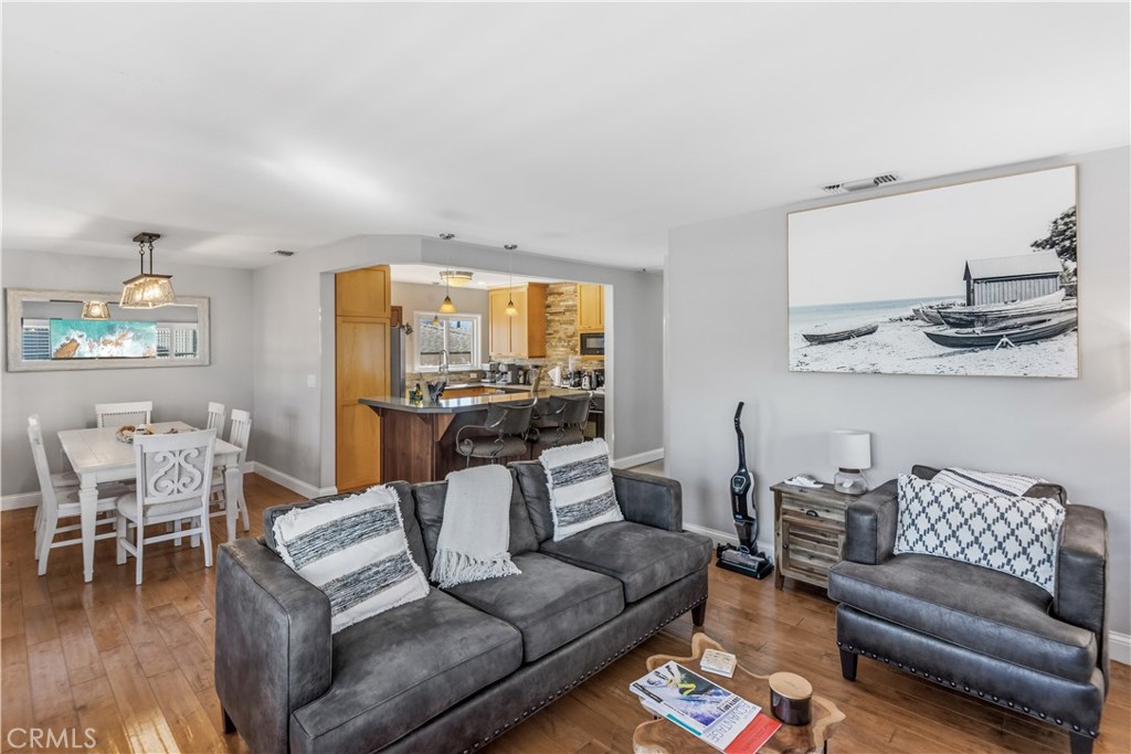 22709 Gaycrest Avenue Torrance, CA 90505 - Photo 5 of 22 a living room with furniture and wooden floor