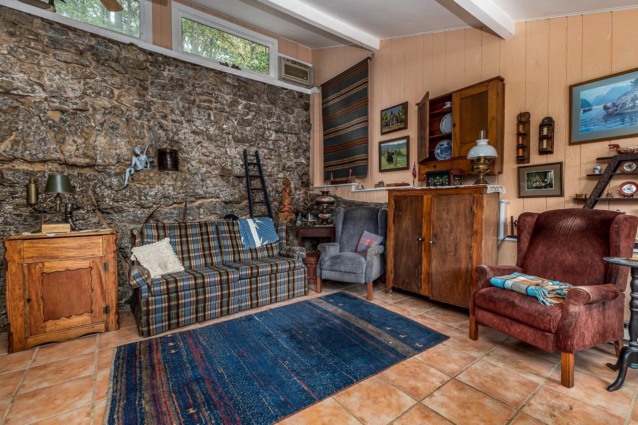 514 3rd Street Galena, IL 61036 - Photo 16 of 25 a balcony with couch and outdoor seating