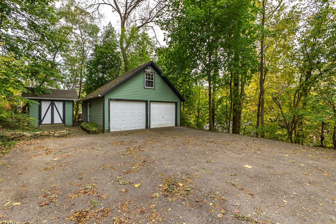 514 3rd Street Galena, IL 61036 - Photo 25 of 25 a house with trees in front of it