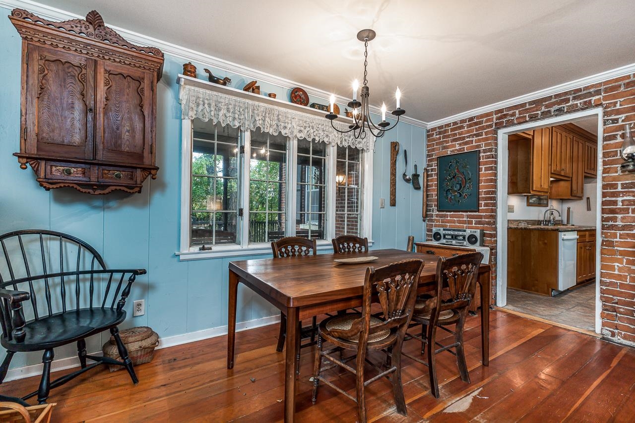 514 3rd Street Galena, IL 61036 - Photo 9 of 25 a view of a dining room with furniture window and wooden floor