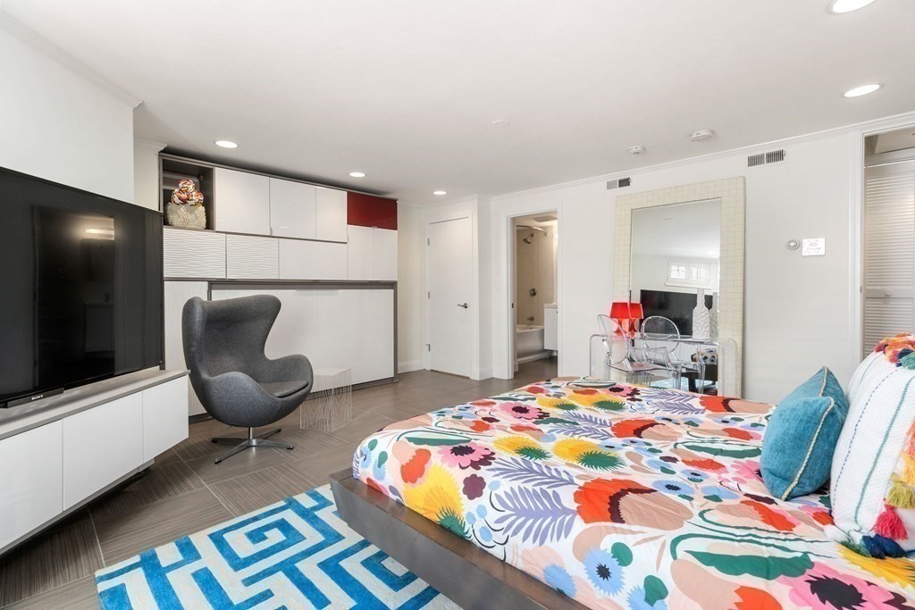 352 Commonwealth Avenue, Unit 2 Boston, MA 02115 - Photo 17 of 25 a bedroom with a bed and a couch