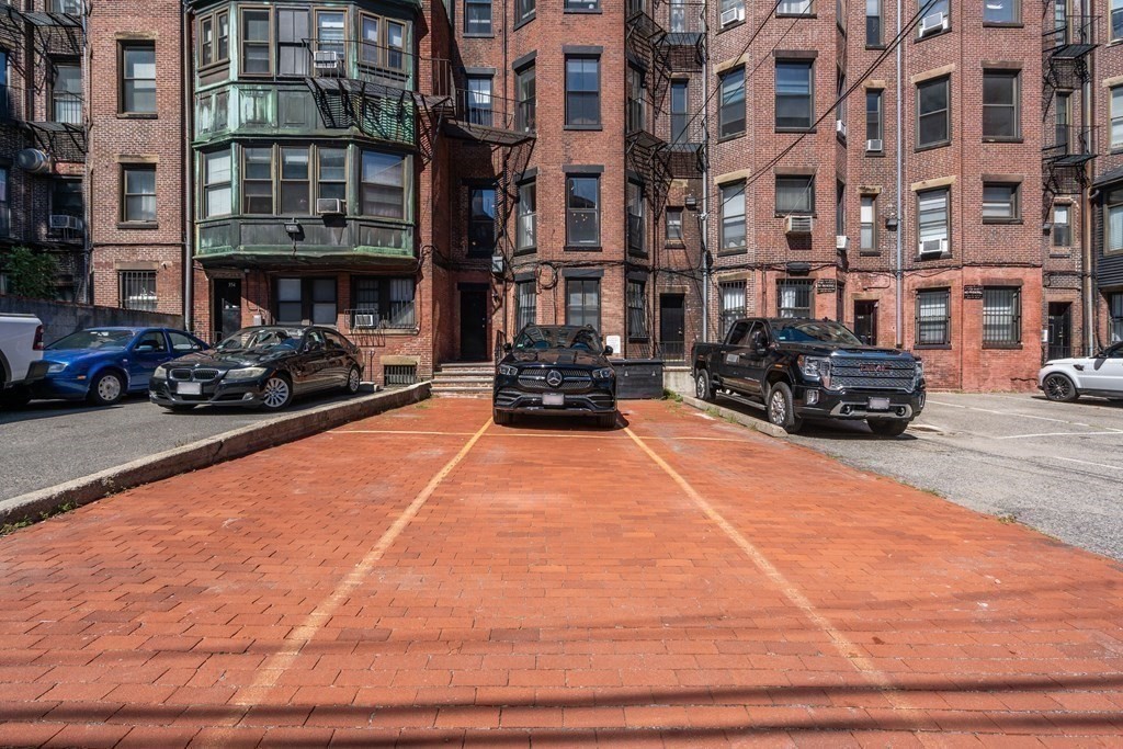 352 Commonwealth Avenue, Unit 2 Boston, MA 02115 - Photo 20 of 25 a car parked in front of a building