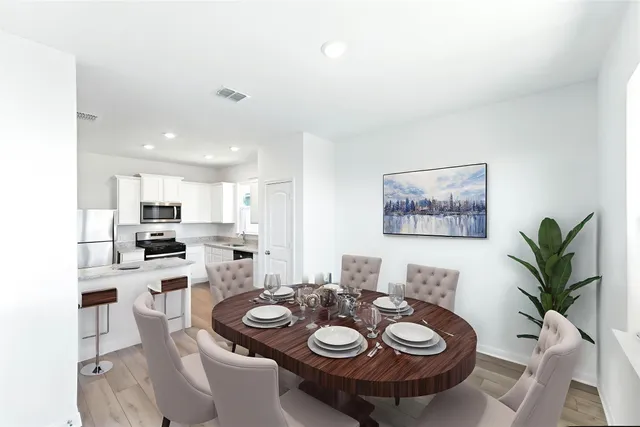 a table and chairs in a kitchen
