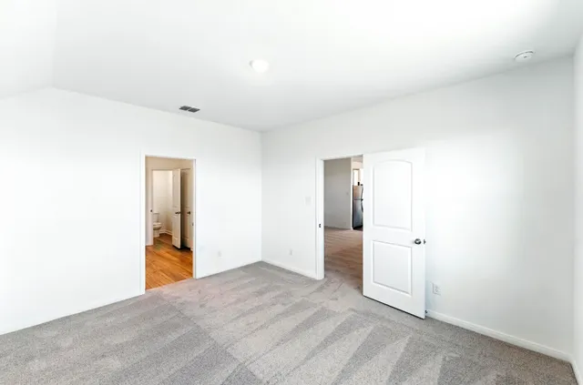 a view of a room with an empty space