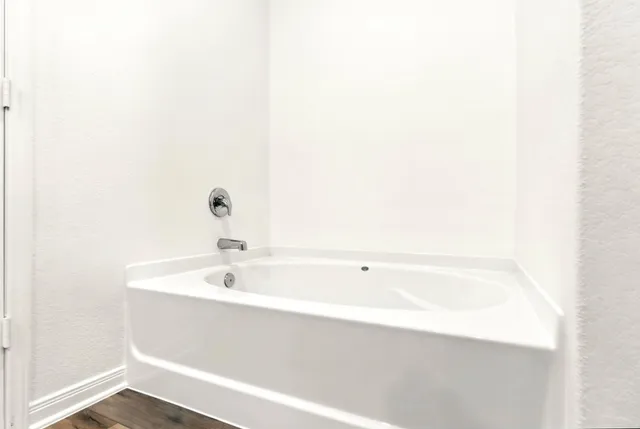 a bathroom with a bathtub