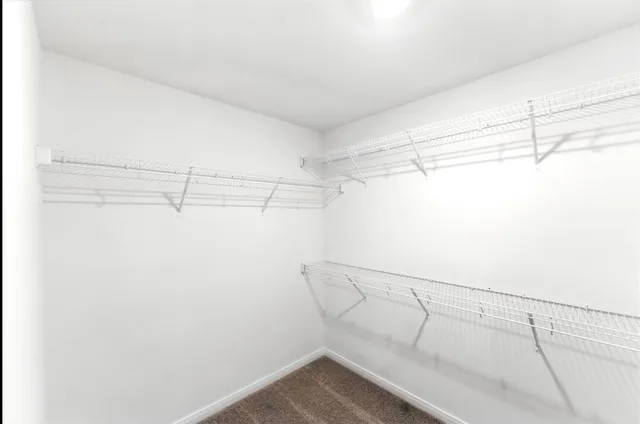 a view of a room with racks on the wall