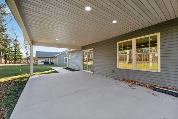 a view of a house with a big yard
