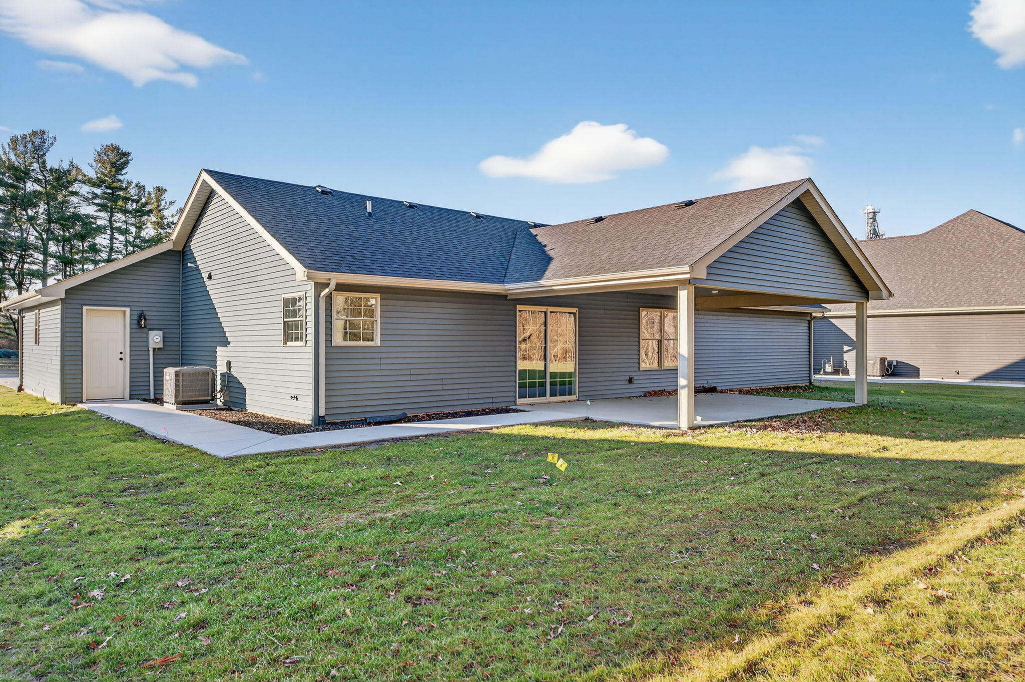 1611 Elderberry Street Southeast De Motte, IN 46310 - Photo 31 of 31 a view of a house with a yard and garage