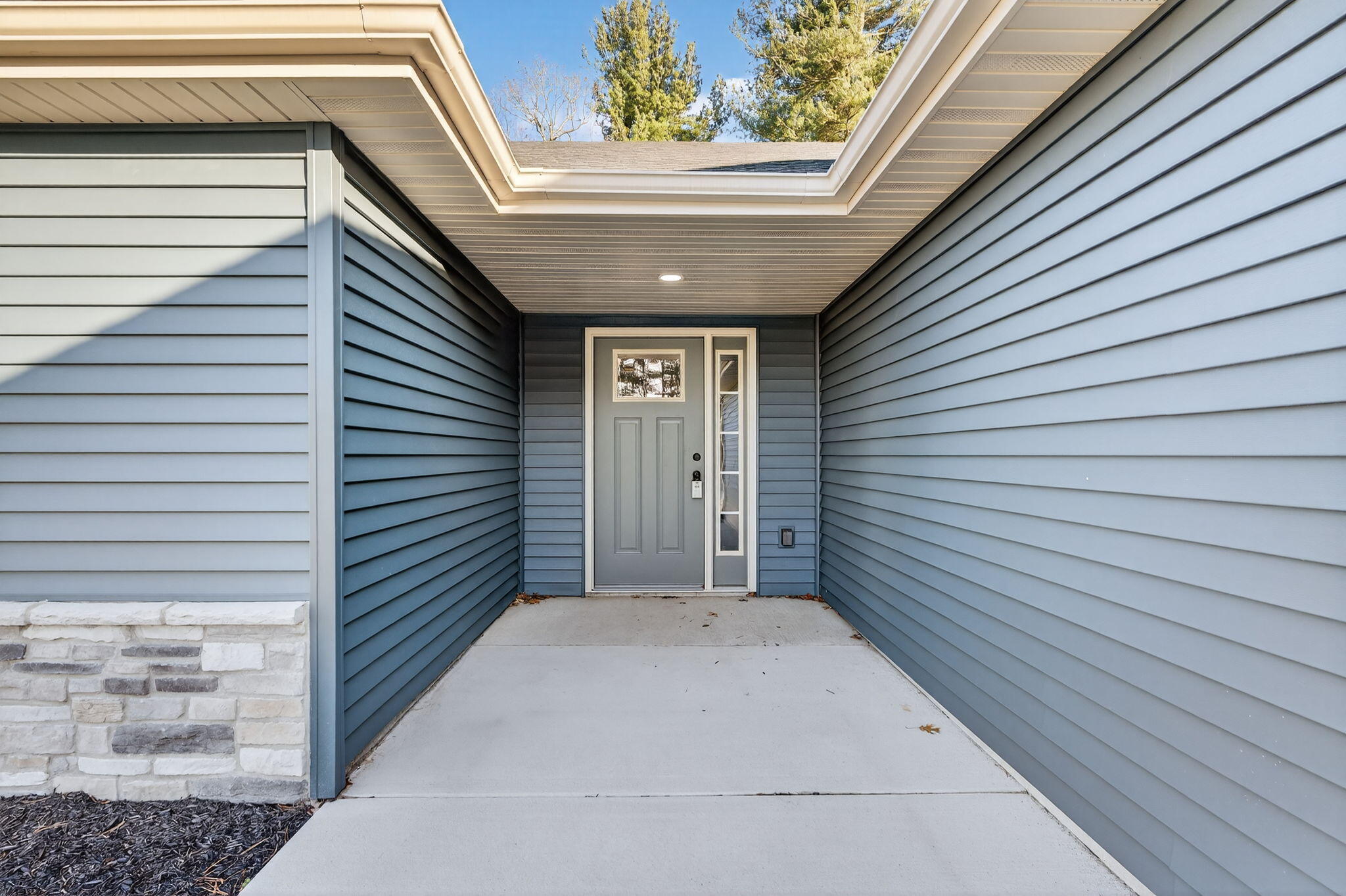 1611 Elderberry Street Southeast De Motte, IN 46310 - Photo 5 of 31 a view of a porch