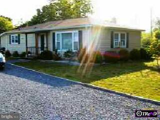 38 Hornerstown Road Cream Ridge, NJ 08514 - Photo 1 of 1 a view of a house with a yard