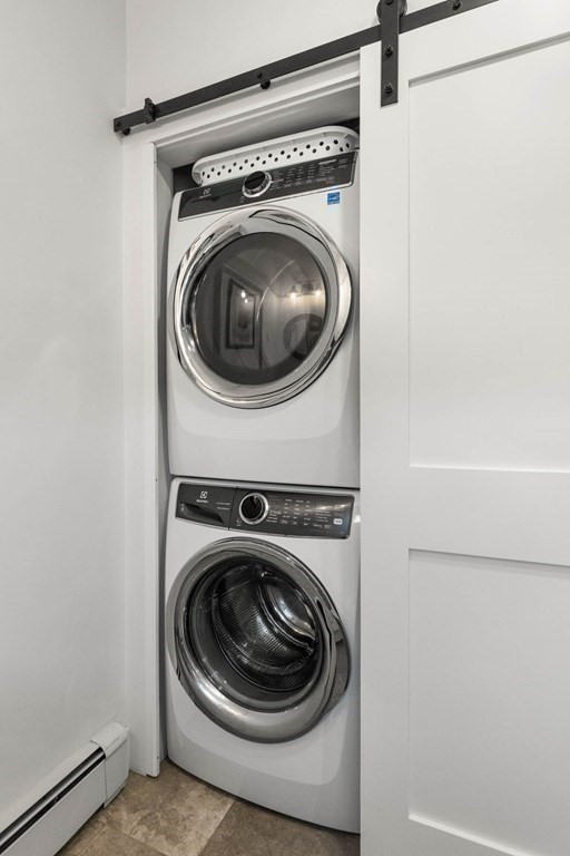 46 Granite Street, Unit DWINTER Rockport, MA 01966 - Photo 17 of 23 a utility room with dryer and washer