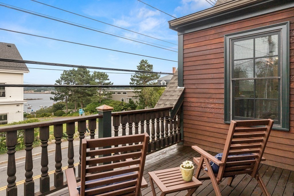 46 Granite Street, Unit DWINTER Rockport, MA 01966 - Photo 4 of 23 a view of a balcony with wooden floor