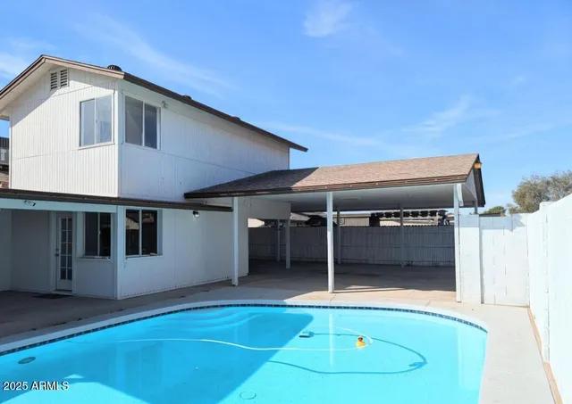 a front view of a house with a garage