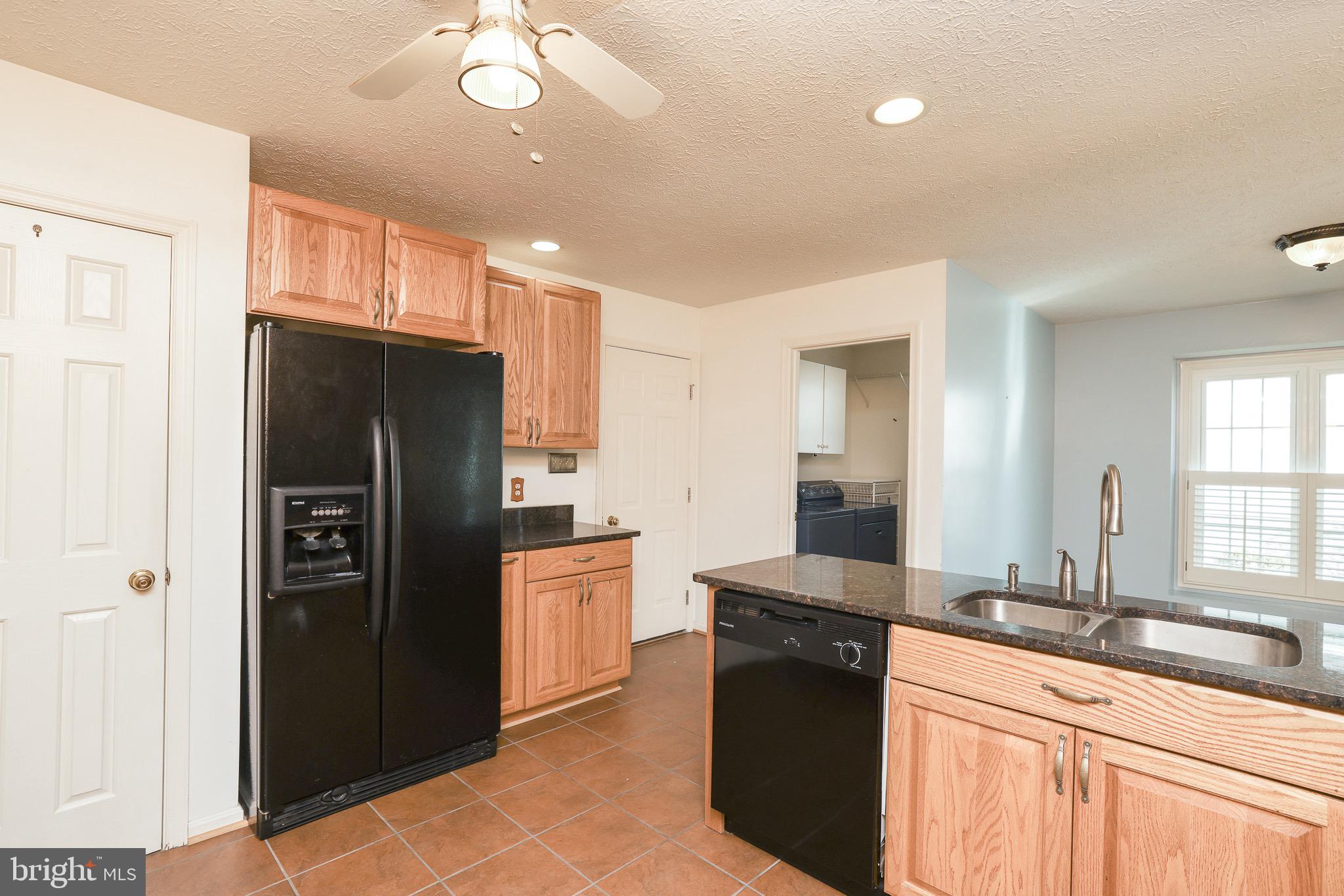 121 Canyon Road Winchester, VA 22602 - Photo 15 of 35 Black appliances blend beautifully