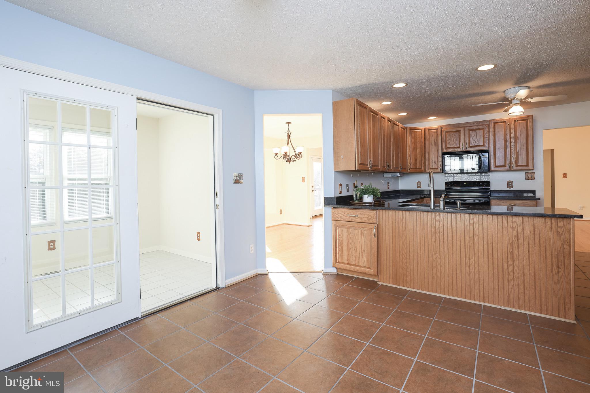 121 Canyon Road Winchester, VA 22602 - Photo 21 of 35 View of dining and sunroom from eating area