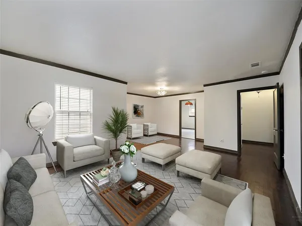 a living room with furniture rug and window