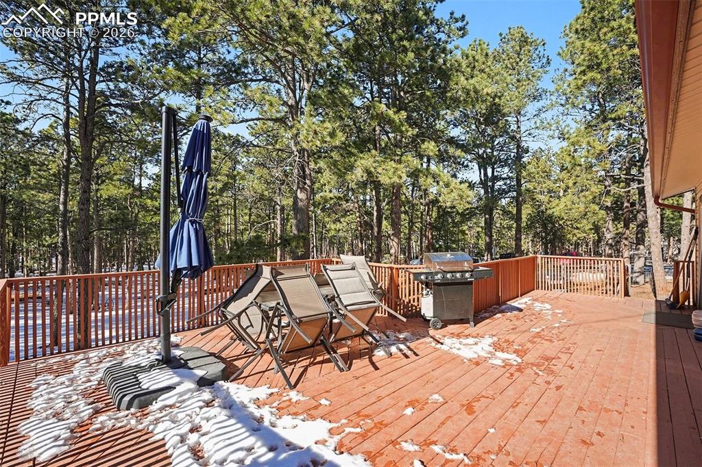 8265 Tannenbaum Road Colorado Springs, CO 80908 - Photo 26 of 50 a view of a terrace with furniture