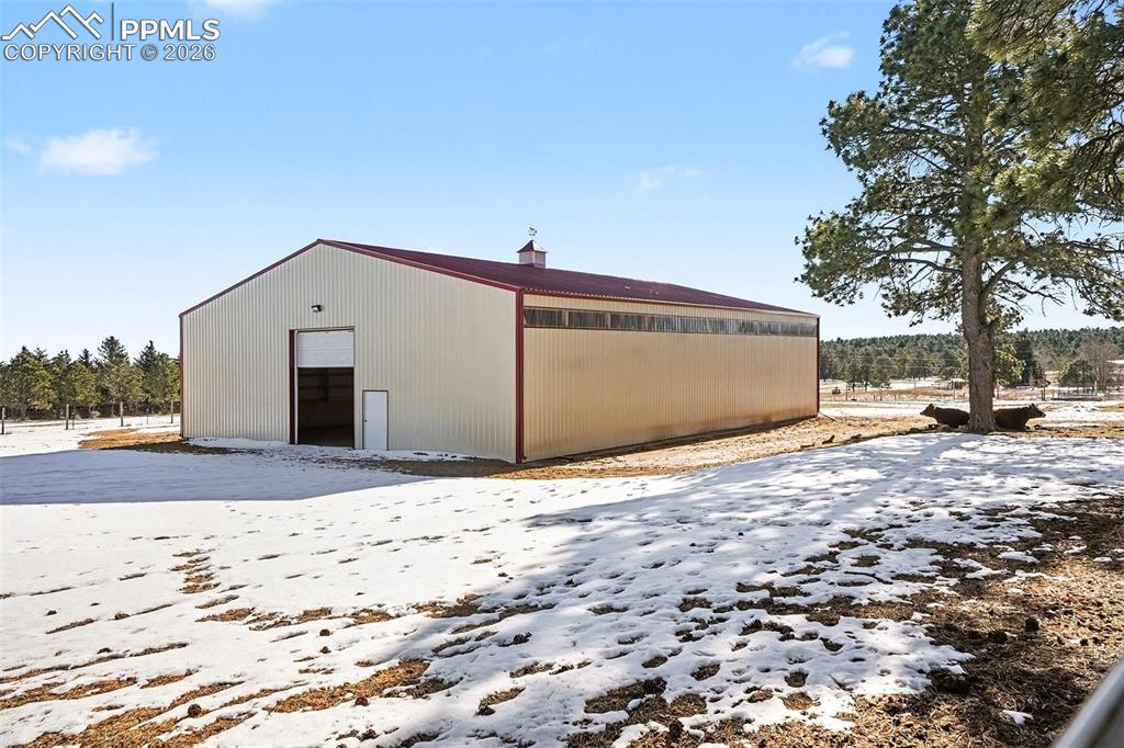 8265 Tannenbaum Road Colorado Springs, CO 80908 - Photo 31 of 50 a front view of a house with a yard